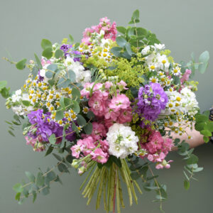 Photo showing a sample of a scented flowers en masse bouquet, using stocks, available to order from Kensington flowers London