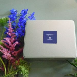Sample of a Blaham Bakes tin, that the tiffins are packaged in. Available to order from Kensington flowers London, as part of the flowers and chocolate tiffin gift set.