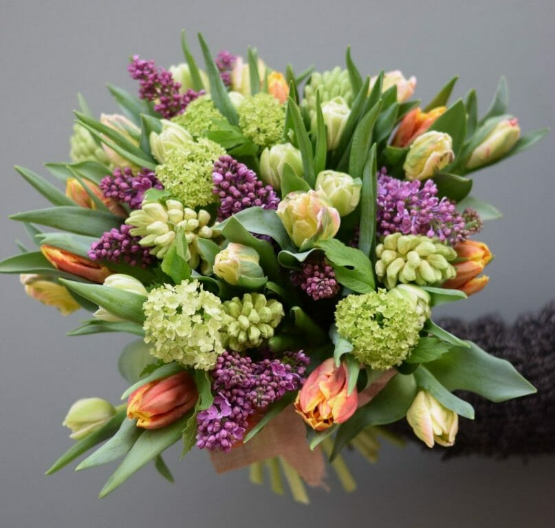 Photo of Spring flower bouquet including Parrot Tulips mix colours from Kensington flowers