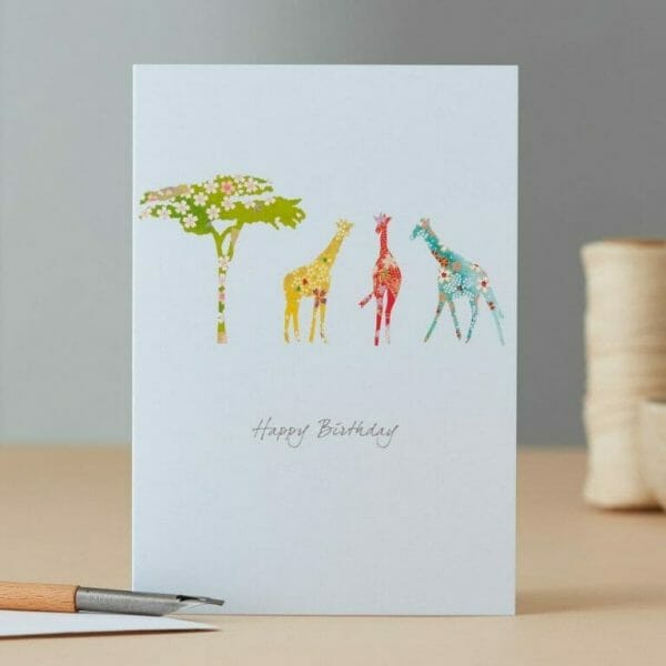 Photo showing a sample of an Illustrated Giraffe & Tree Birthday Card available at Kensington Flowers