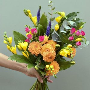 Sample of A Luxury Handful bunch of flowers in mixed vivid colours available at Kensington flowers London