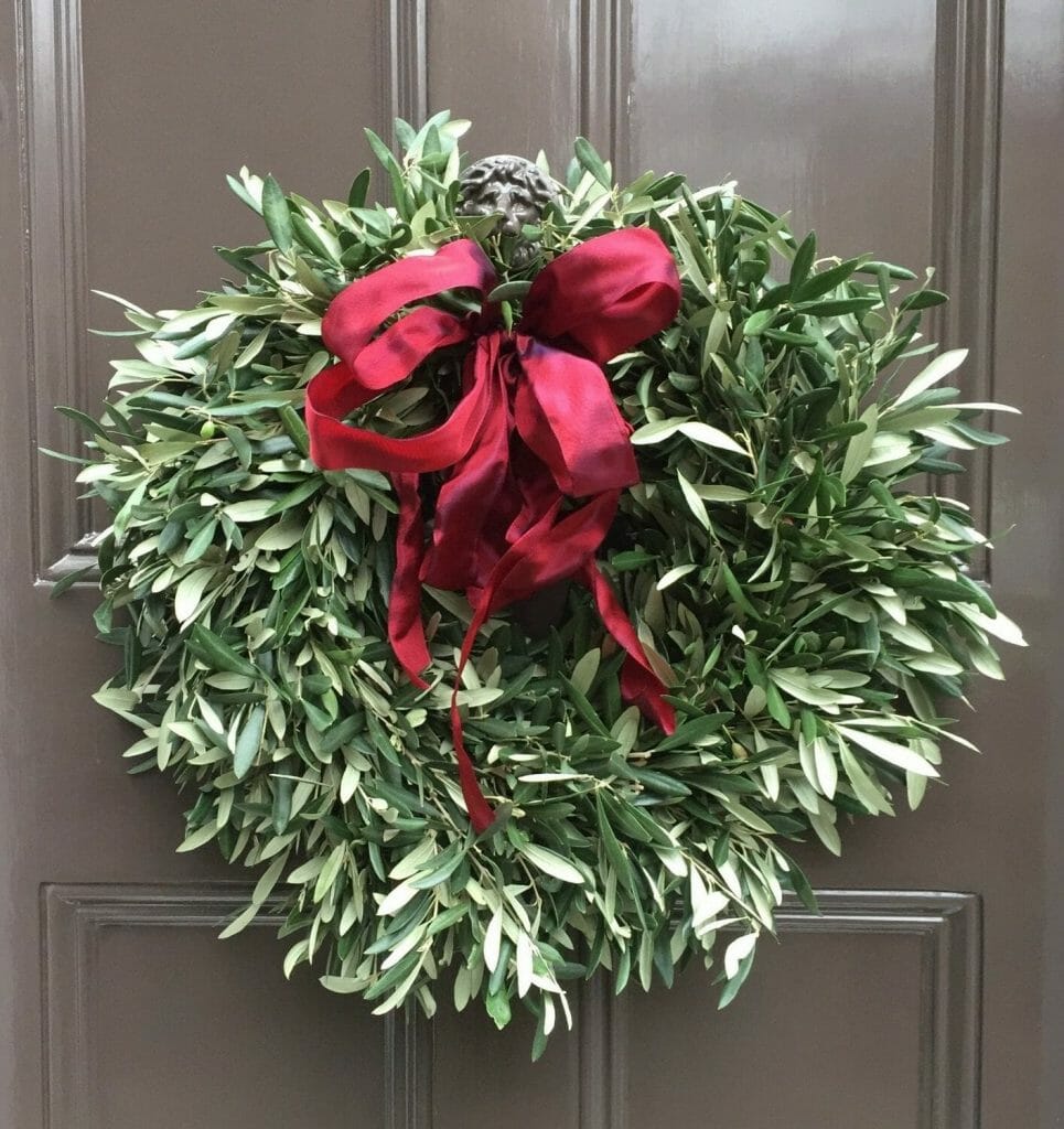 Photo showing a sample of an Olive Christmas Door Wreath Kensington flowers London