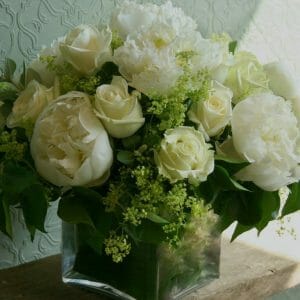 Photo showing a sample of a Studio florist choice Vase Arrangement - White peony and rose flowers - Kensington flowers, London
