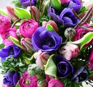 Seasonal spring flower bouquet invited and mixed colours available from Kensington flowers, London