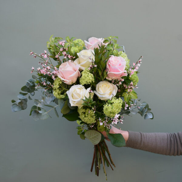 Photo showing a sample of one of the seasonal rose bouquets, available from Kensington Flowers London