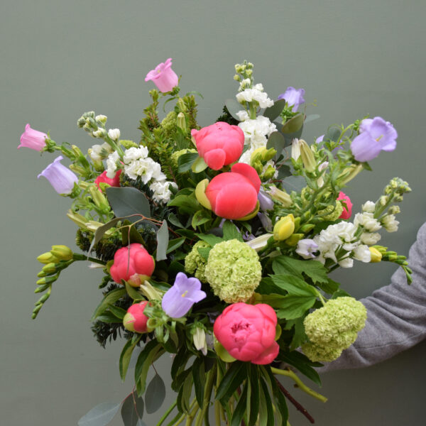 Photo showing a sample of a seasonal peony bouquet in mix colour available to order from Kensington flowers London