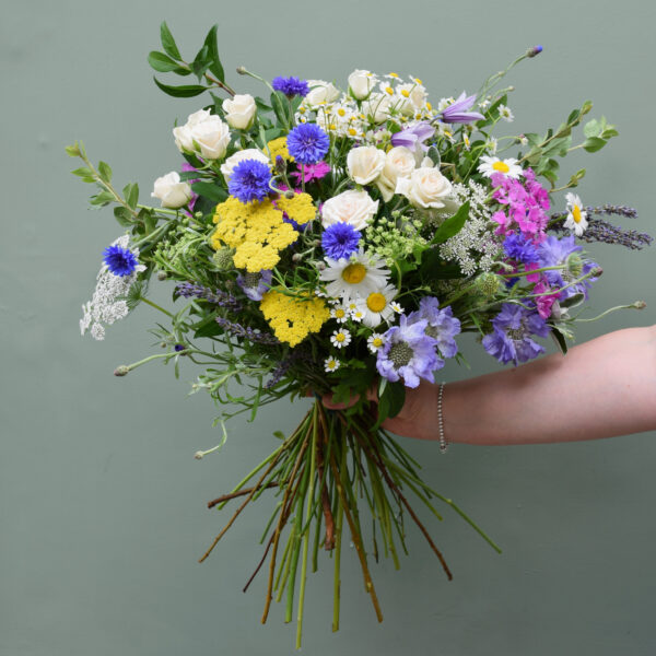 Photo showing a sample of a large summer meadow bouquet available to order from Kensington flowers London