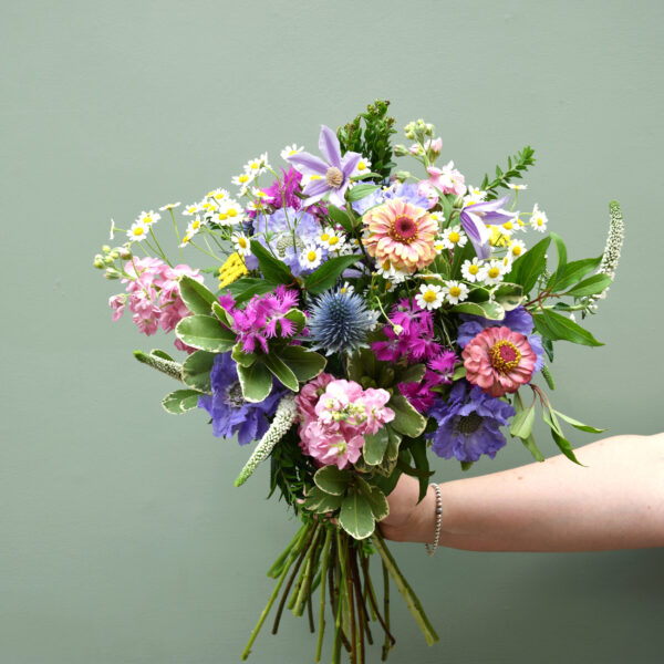 Photo showing a sample of a small size, summer meadow bouquet available to order from Kensington flowers London