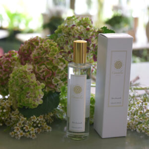 Photo shows a sample of the Candalia room spray available to order with flowers, as part of a gift set available from Kensington Flowers London