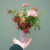 Sample of the luxury stoneware clay glazed botanical vase of flowers, available to order from Kensington Flowers London