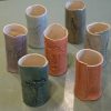 Photo showing a sample of the stoneware clay botanical vases available to order from Kensington Flowers London