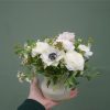 Sample of the luxury stoneware clay glazed pot of flowers, available to order from Kensington Flowers London
