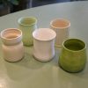 Photo showing a sample of the stoneware clay glazed pots available to order from Kensington Flowers London