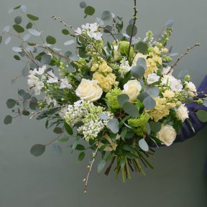 Photo showing a sample of a funeral sheaf in white colour, available to order from Kensington flowers London