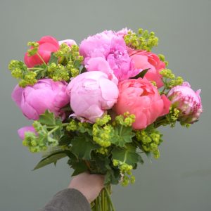 Photo showing a sample of a peony en masse bouquet available to order from Kensington flowers London